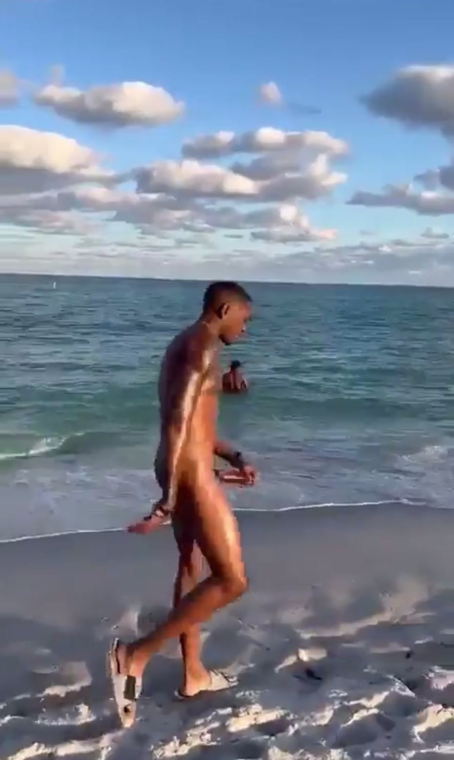 Straight Black man with enormous dick on nude beach