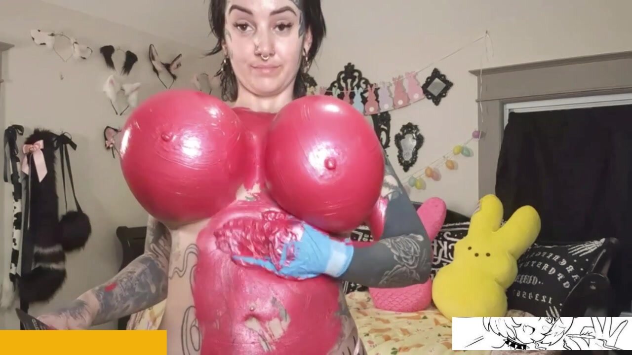 goth bimbo paints her huge tits