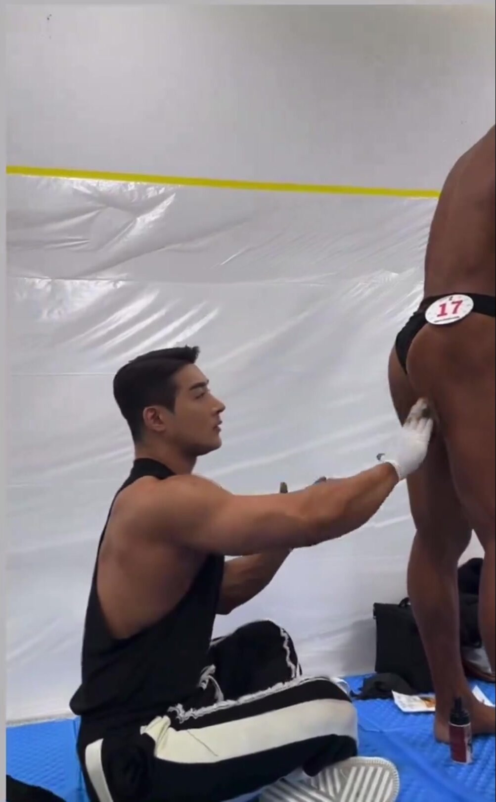 Prepping an Asian bodybuilder