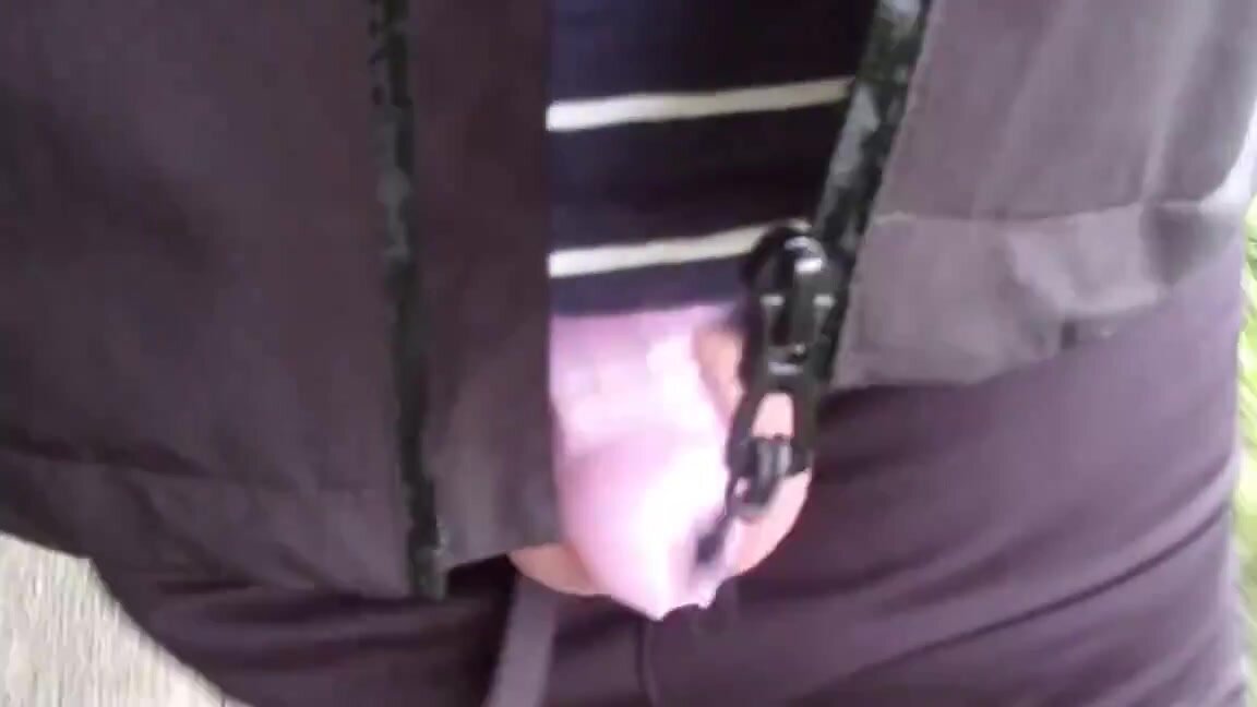 Outdoor caged cock showoff