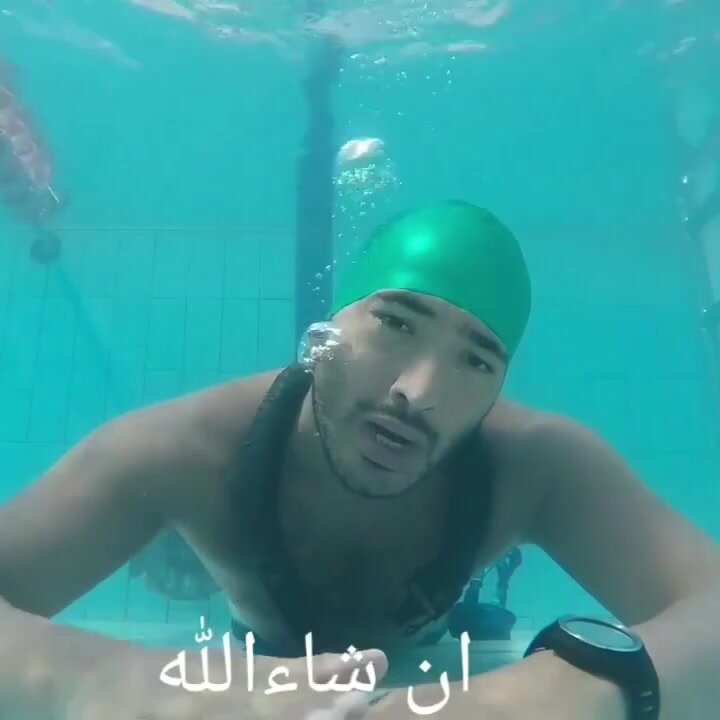 Arab cutie talking barefaced underwater