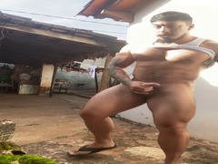 sexy muscle stud beats his dick outdoors