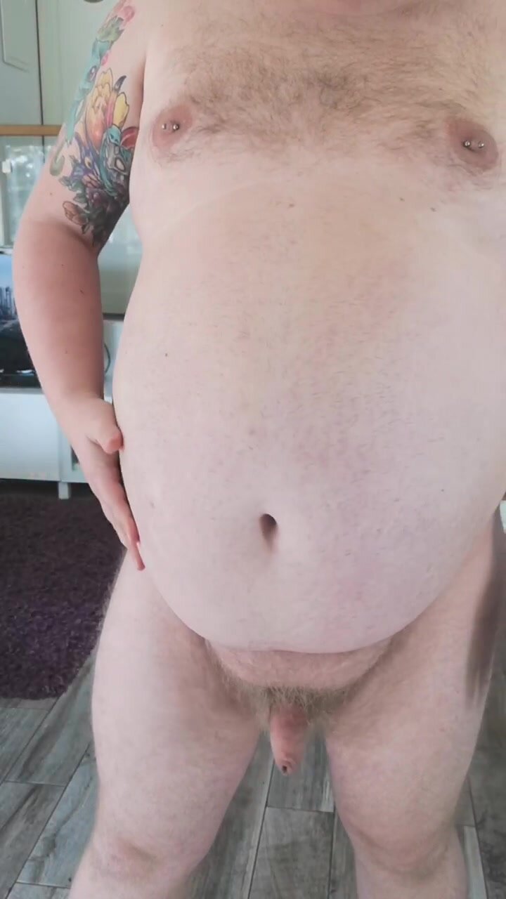 Chubby guy showing belly