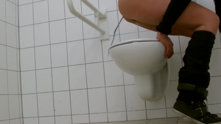 Spraying diarrhea in a public toilet..