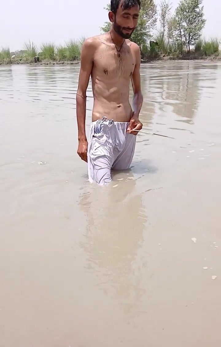 Paki swimming in the river