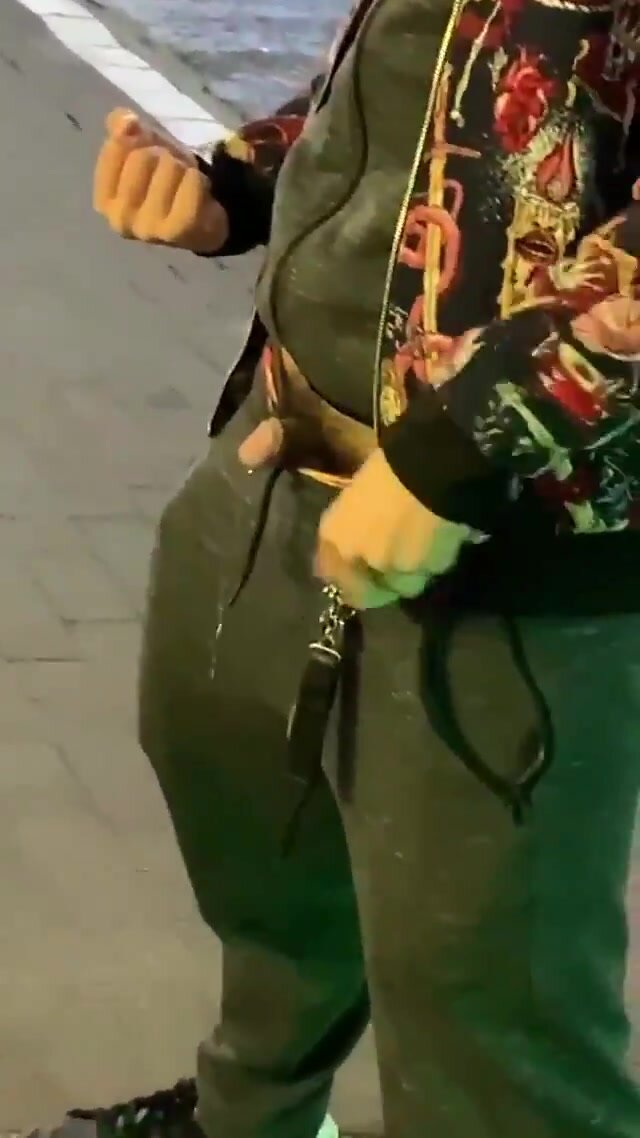 Japanese guy pisses on the street