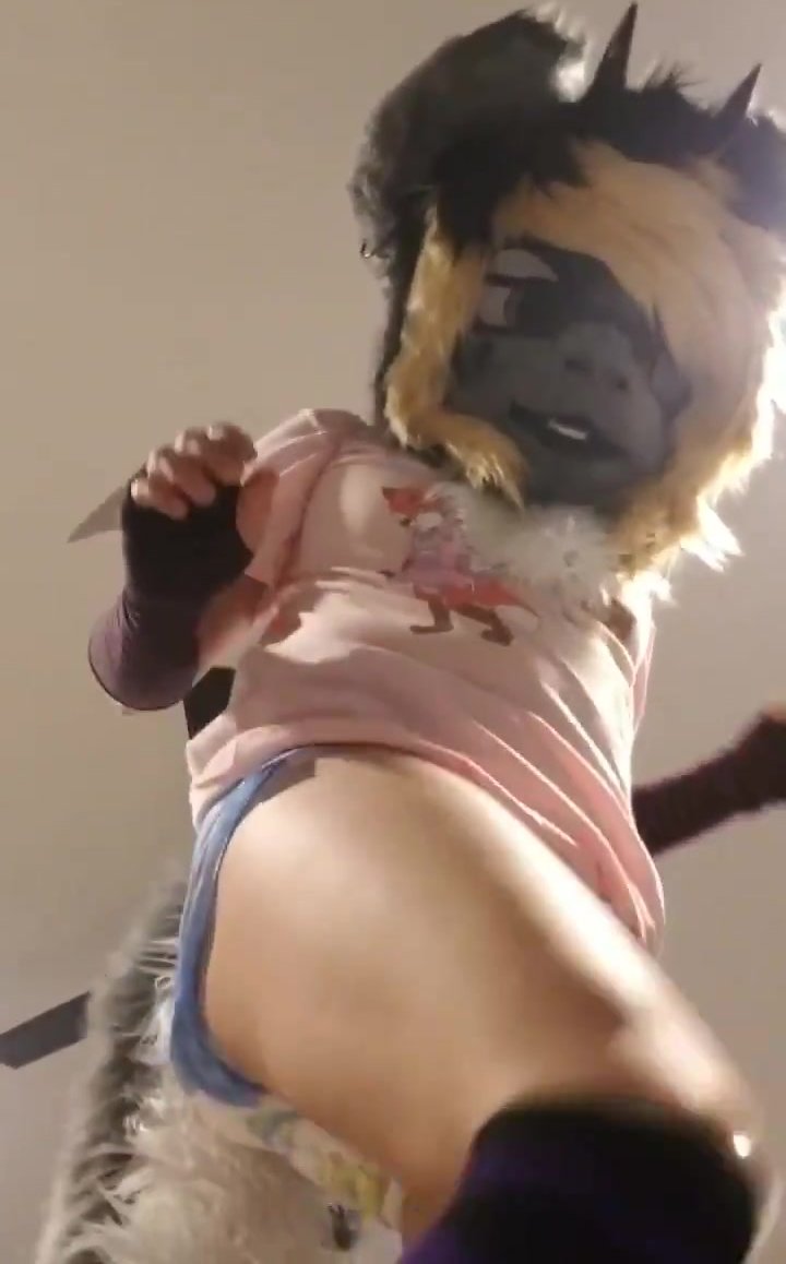 Diapered fursuiter sits on you