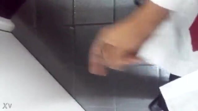 Cumming on the floor of a restroom