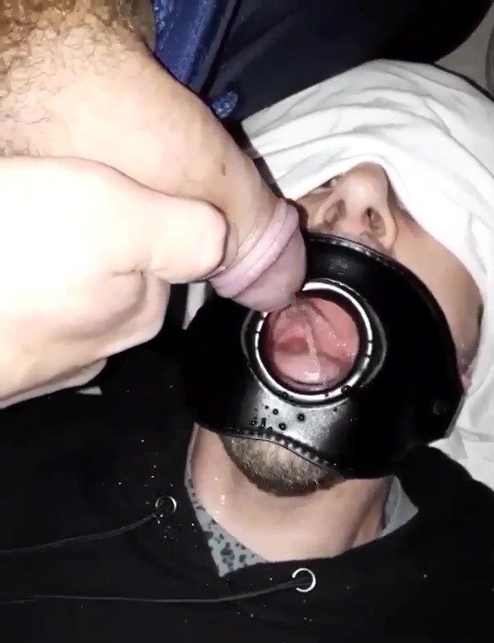 Blindfolded slut in a mouthspreader gag!