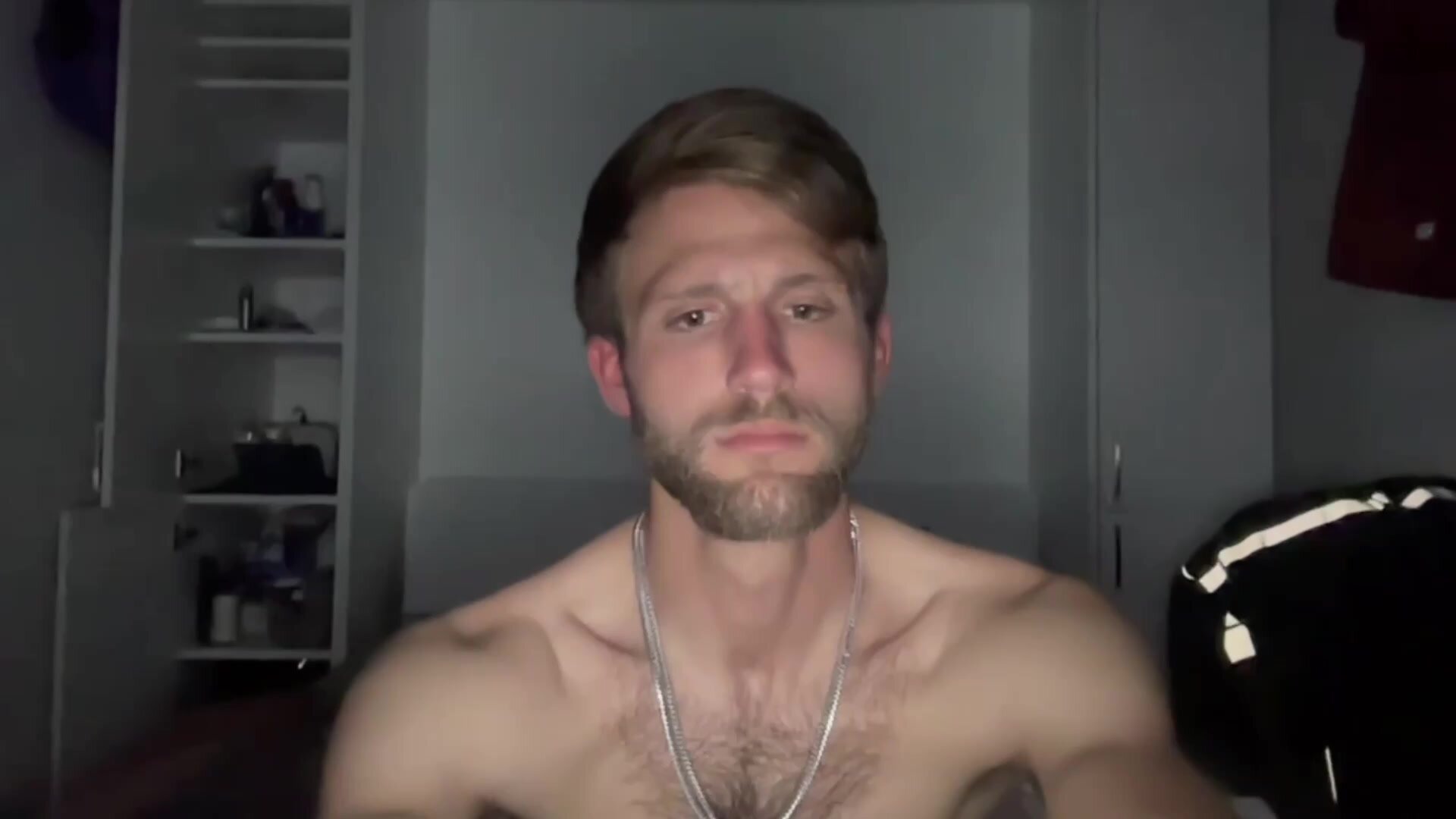 good-looking guy shows off his hog