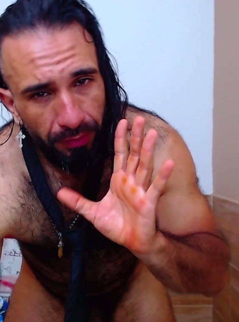 Hairy latino eats his own milk