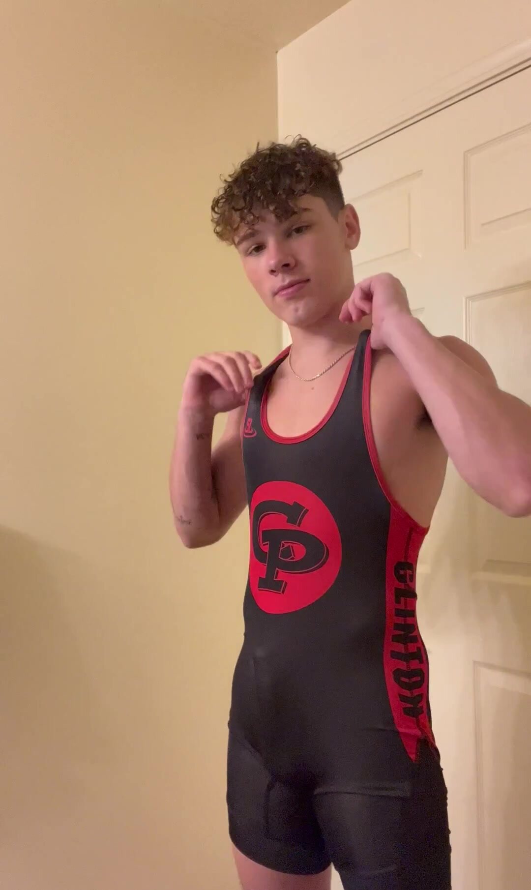 wrestler in singlet jacking off