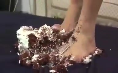Crushing a Chocolate Icing Cake