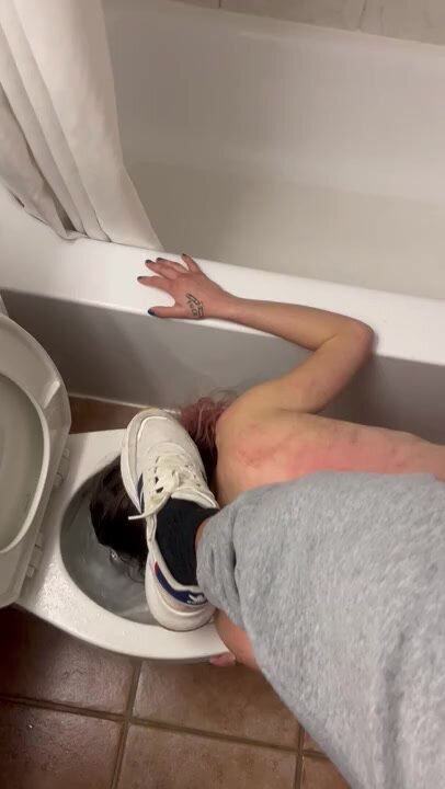 WOMAN IS MADE TO CLEAN A TOILET USING HER TONGUE