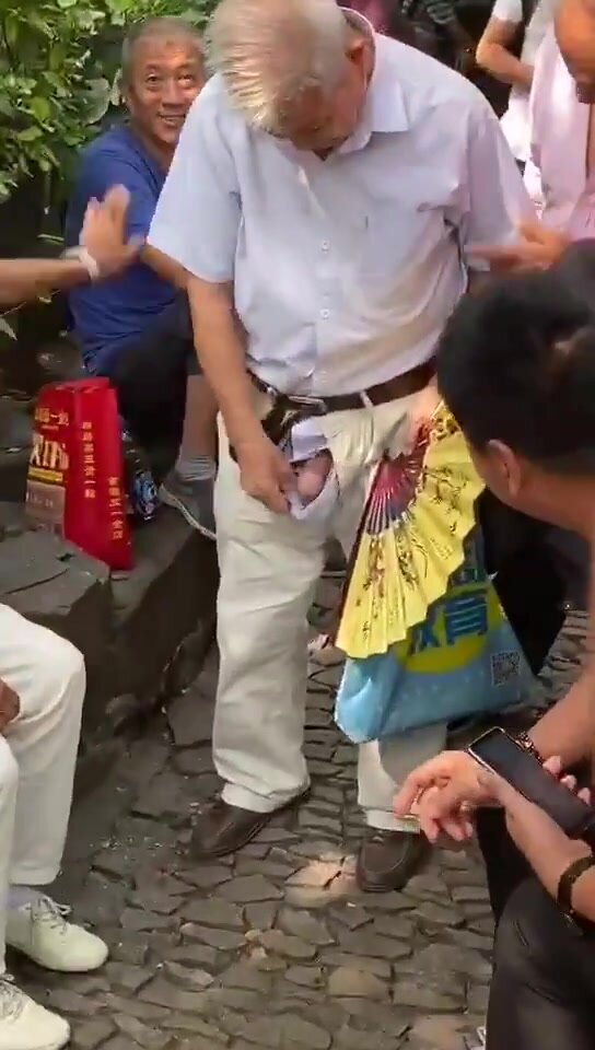 Mature Asian cock out in public