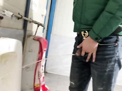 spy asian green jacket guy pissing