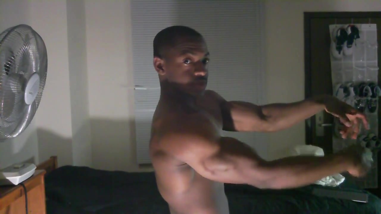 Young african bodybuilder posing