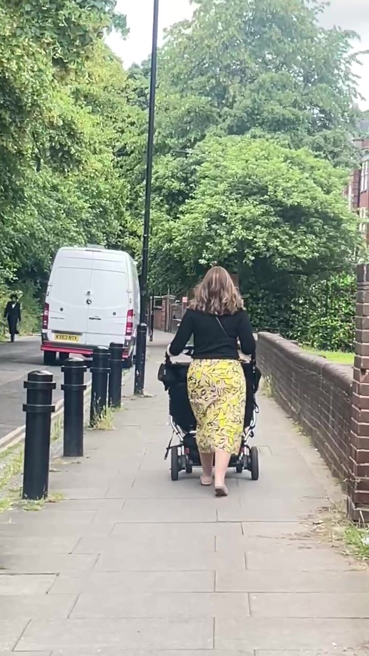 Jewish mum pushing  a buggy