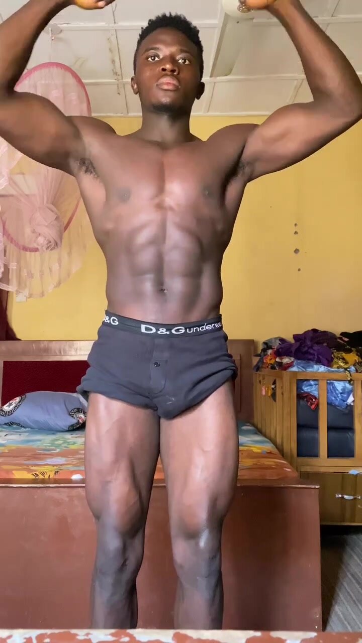 Young Black African show his muscles