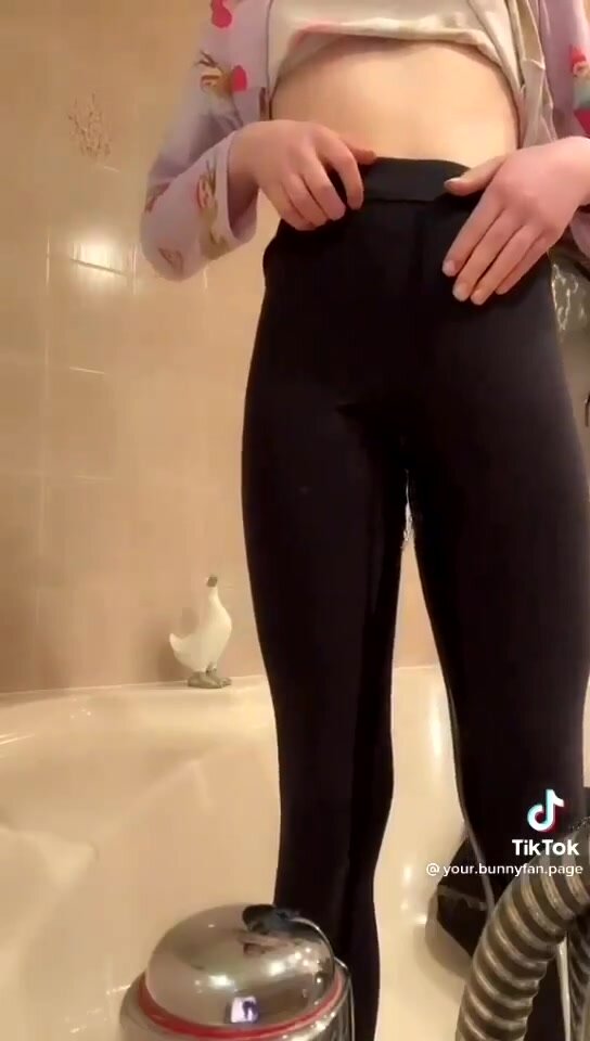 girl pees leggings in bath