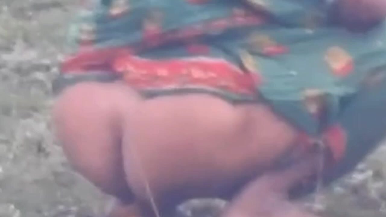 Indian desi lady pissing shitting in open place
