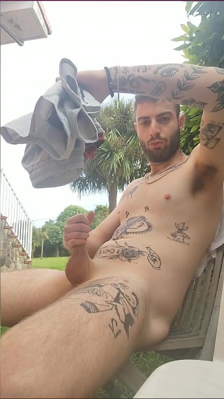 spanish guy jerking off and cum in the garden