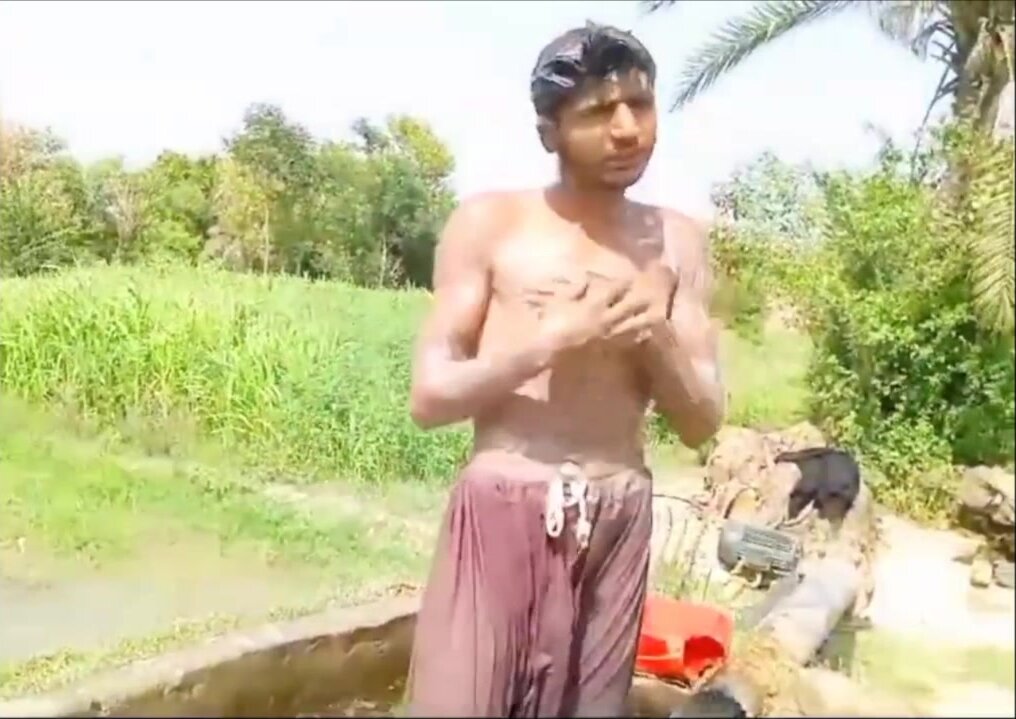 Desi twink bathing in tubewell