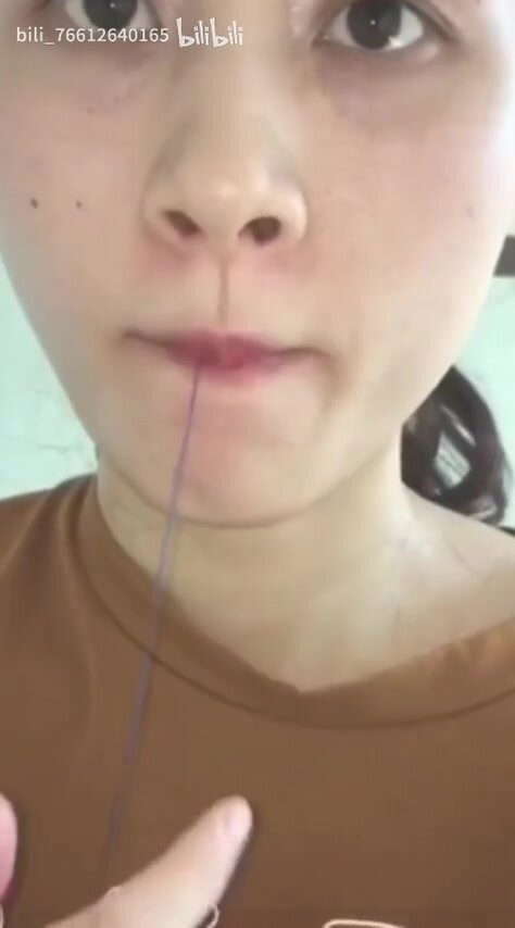 Girl swallowing rope