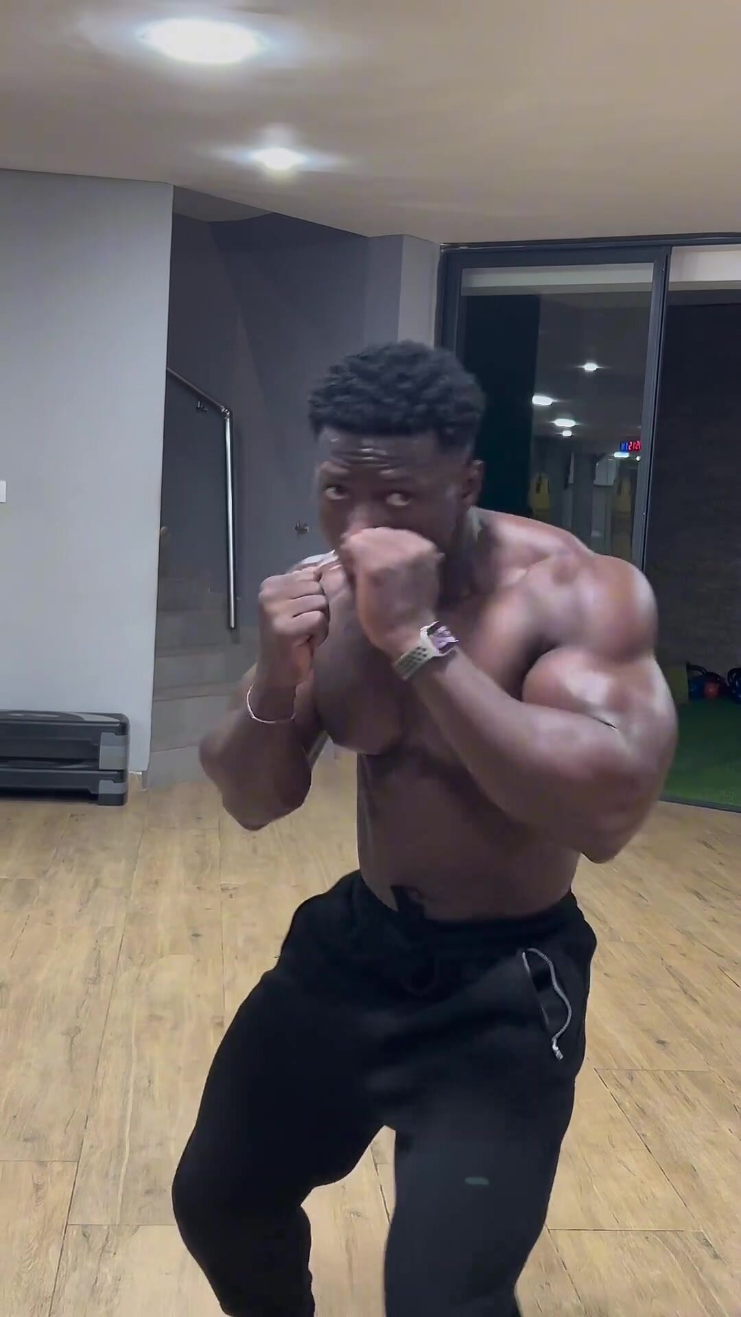Black african muscle male training and posing
