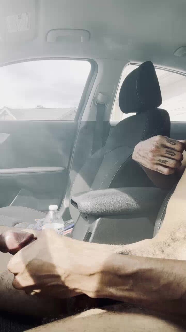 Black hot boi plays with his nipples and dick in car