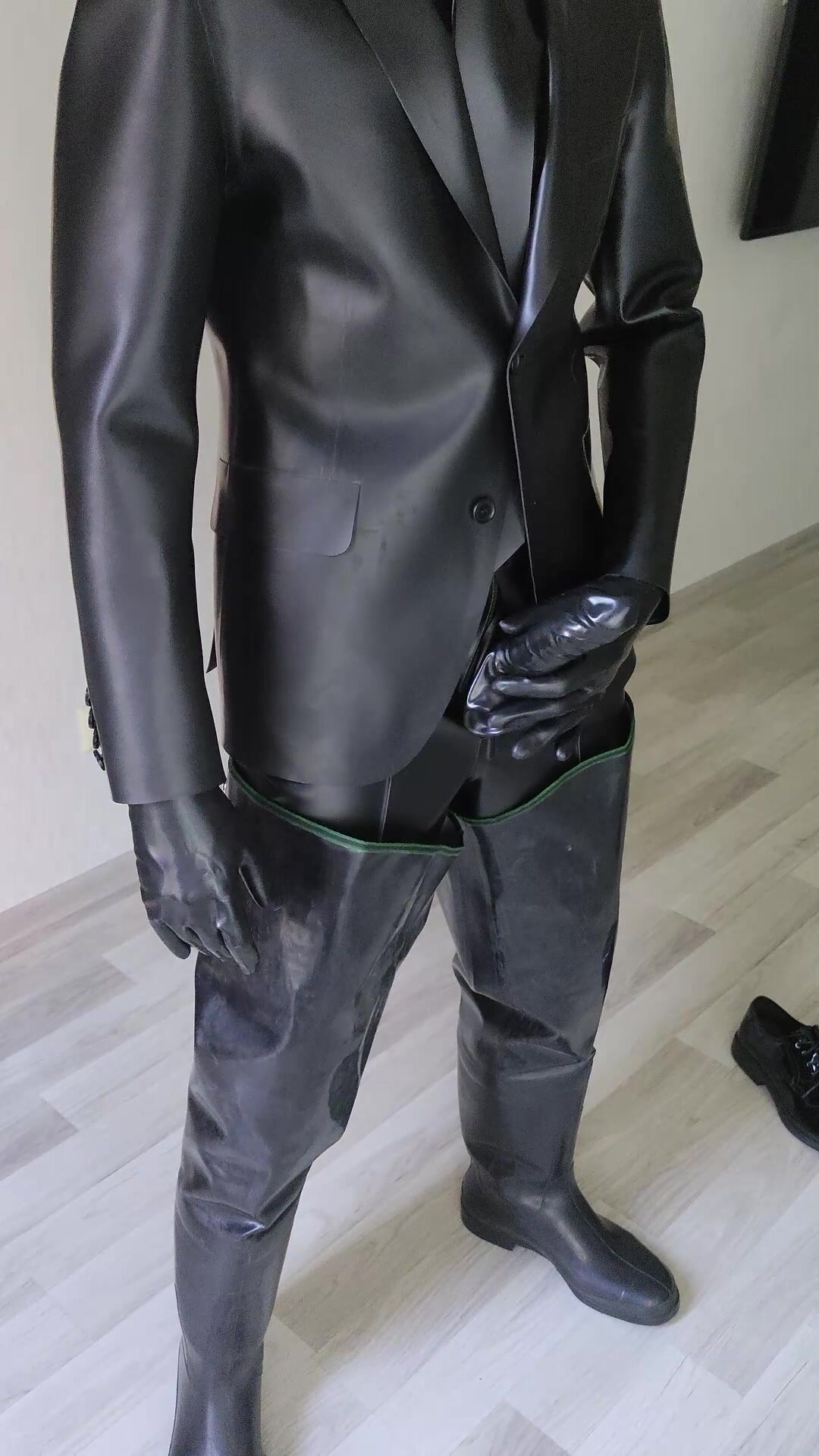 Classic latex suit and waders fun