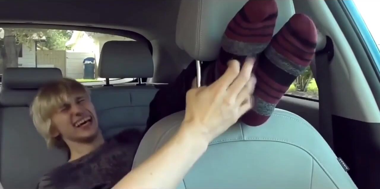 Twink gets his feet tickled in car