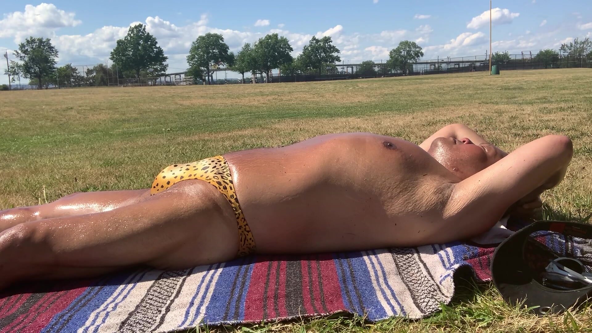 Sunbathing in yellow animal print bikini
