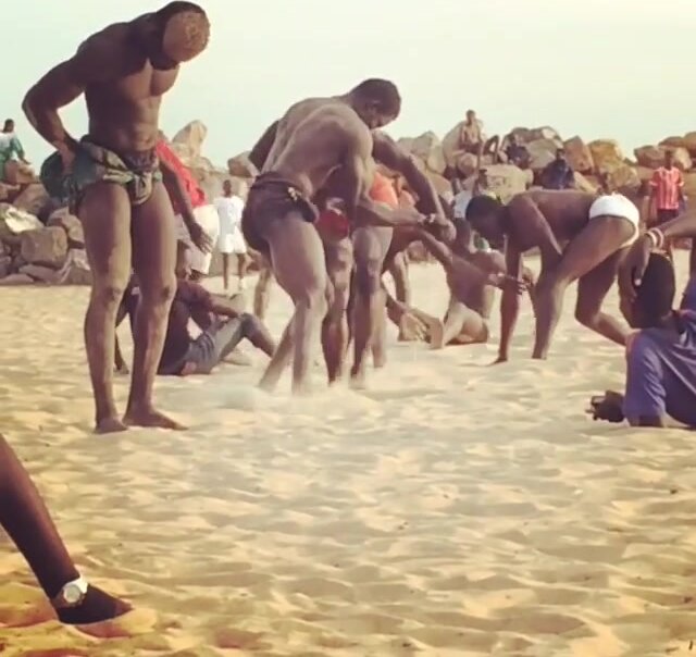 Young Africans Wrestling in the beach