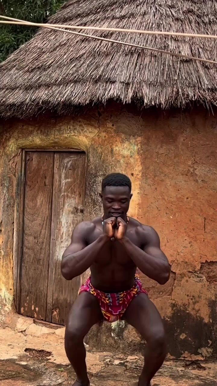 Black African male training muscles in the village