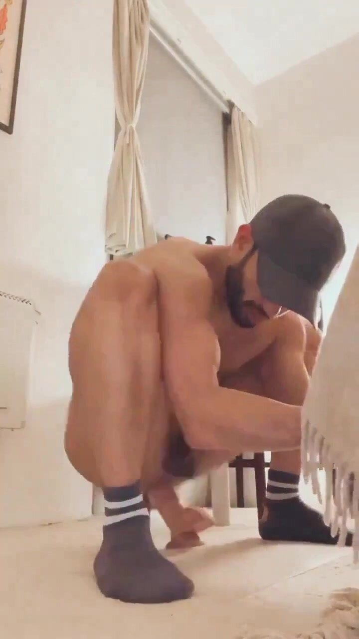 sexy bearded stud riding a dildo