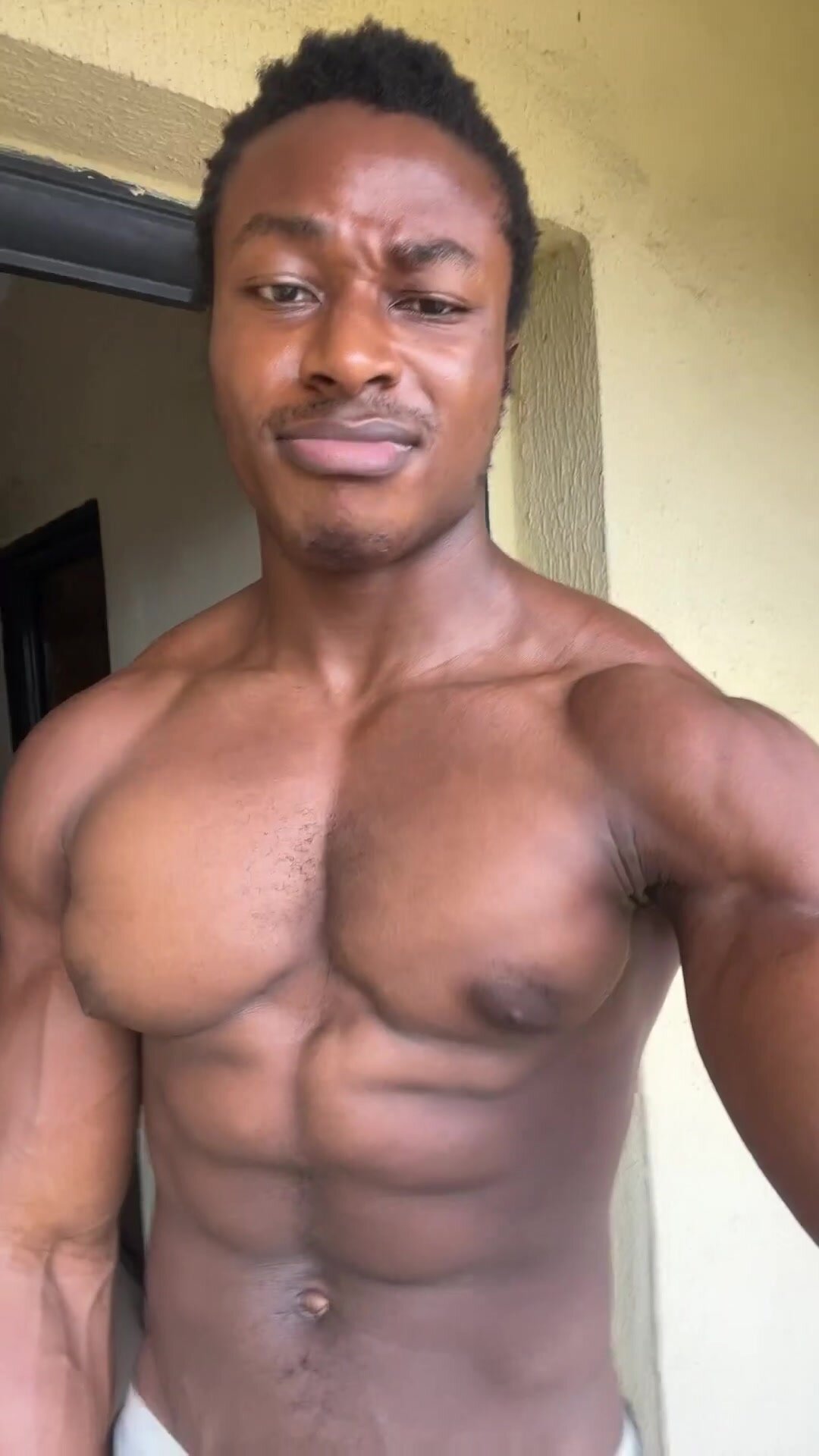 Muscle black male bouncing pecs