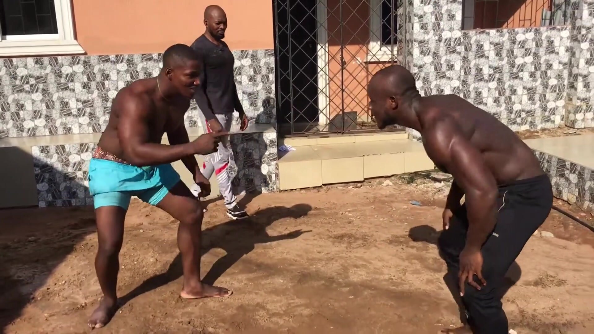 Two muscle african males fight in one minute