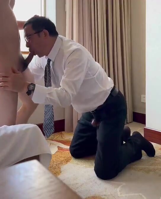 Chinese Professor Sucking Cock in a Hotel
