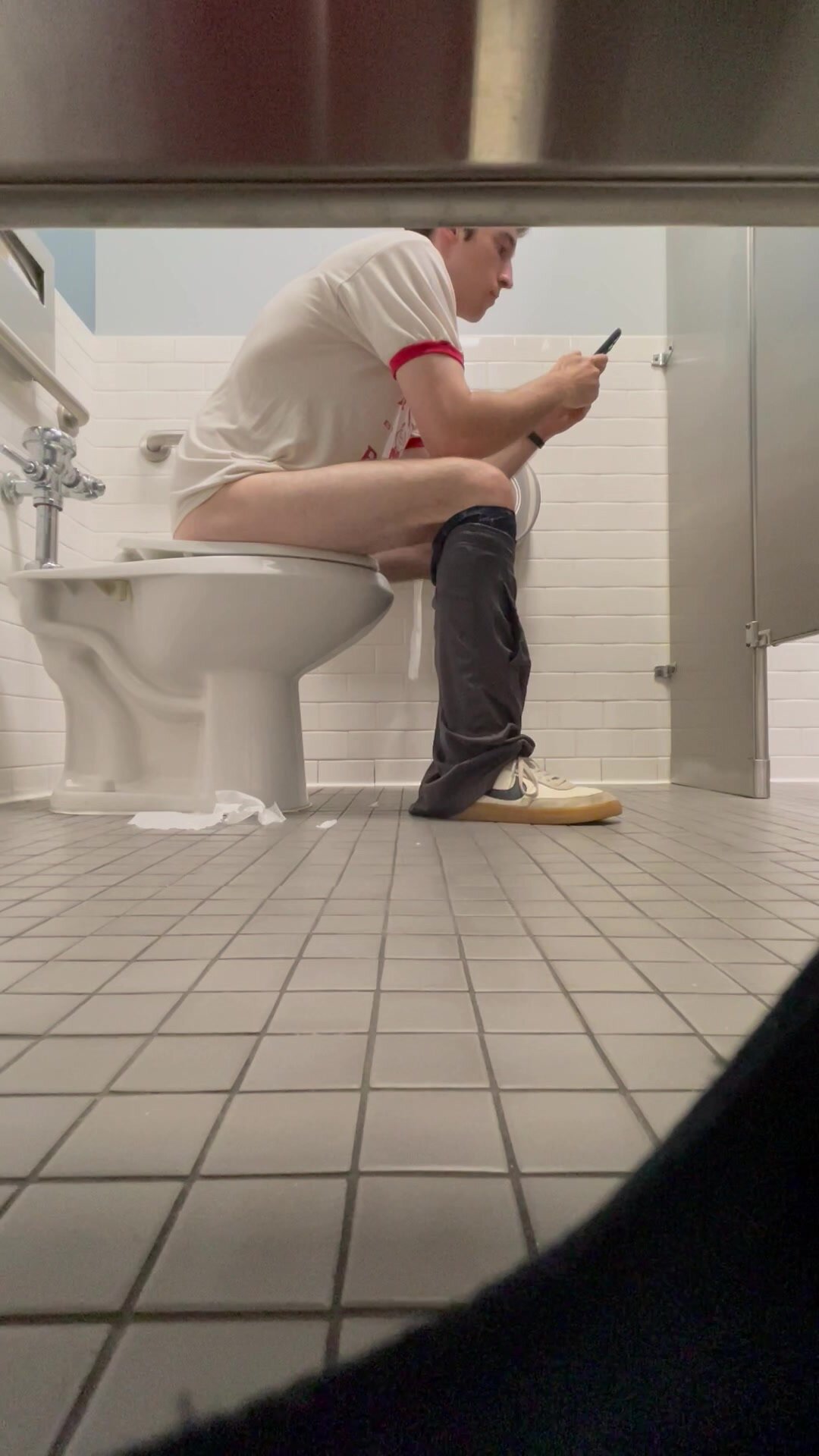 Cute guy sitting on the toilet - video 2