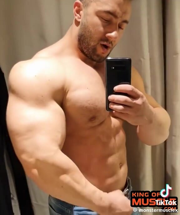 Big muscles in front of the mirror