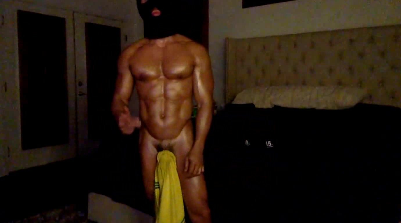 Oiled body with veiled cock