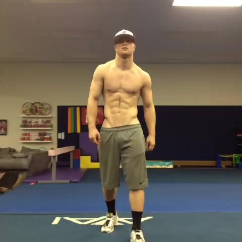 Ripped young jock does insane body rolls