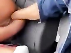 Guy fists his passengers pussy while driving