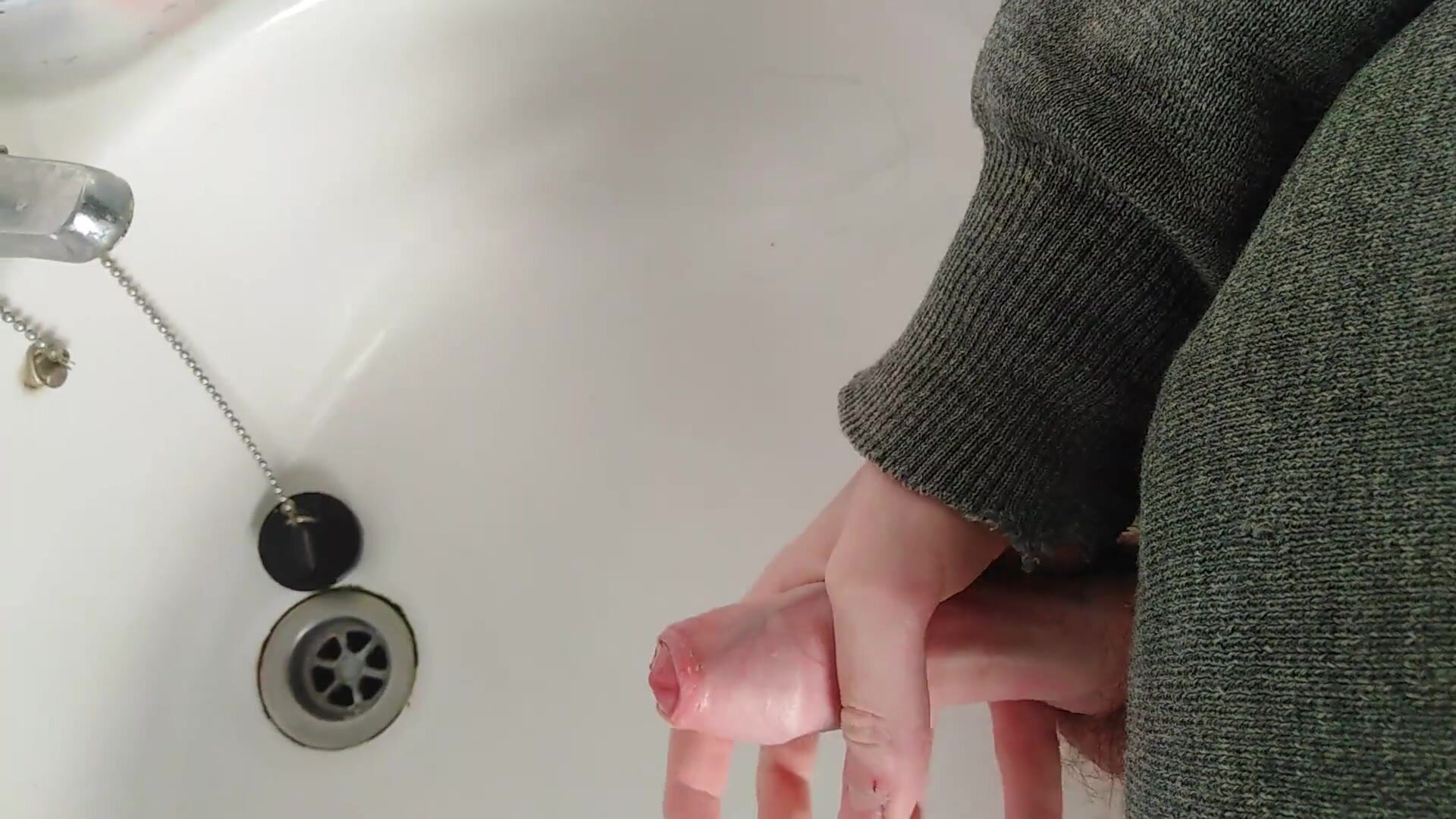 Lad wanks in bathroom