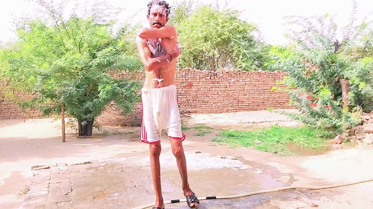 Paki villager bathing
