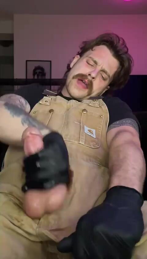 Guy in overalls jerks off
