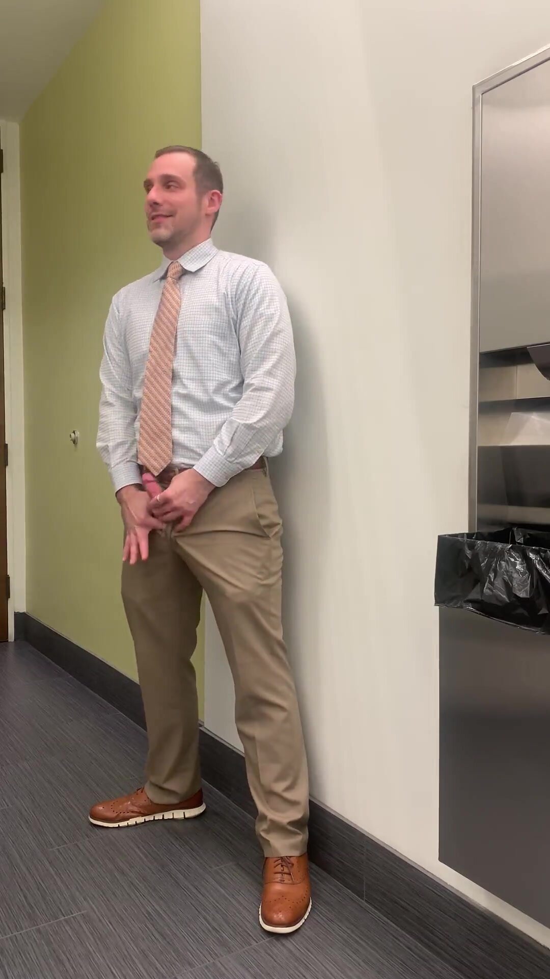 Executive Showing Off In The Men\