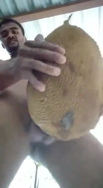 Indian villager with his fruit sex toy