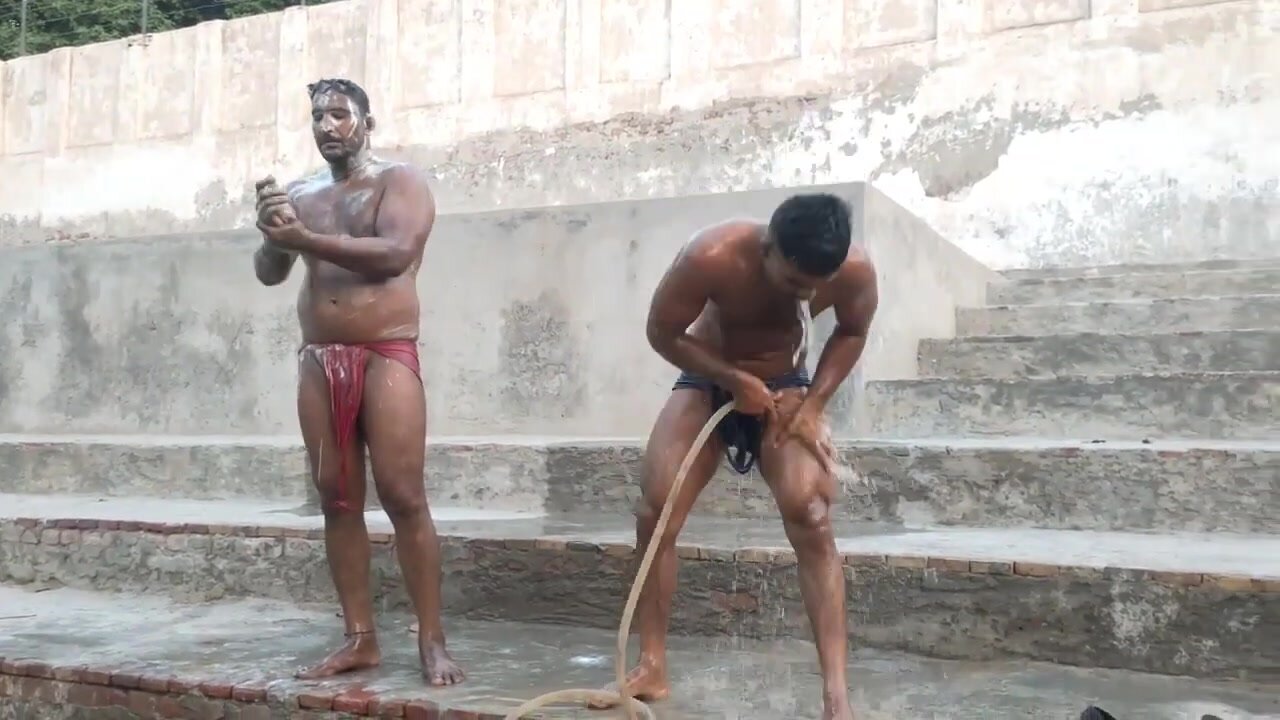 Indian wrestlers bathing